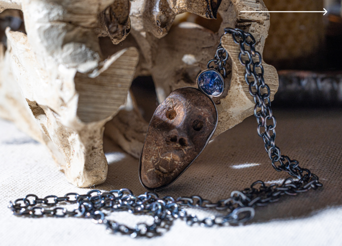Manes Sterling Silver Pendant with Ancient Mediterranean Limestone Maskette & Natural Blue Sapphire Manes Sterling Silver Pendant with Ancient Mediterranean Limestone Maskette & Natural Blue Sapphire