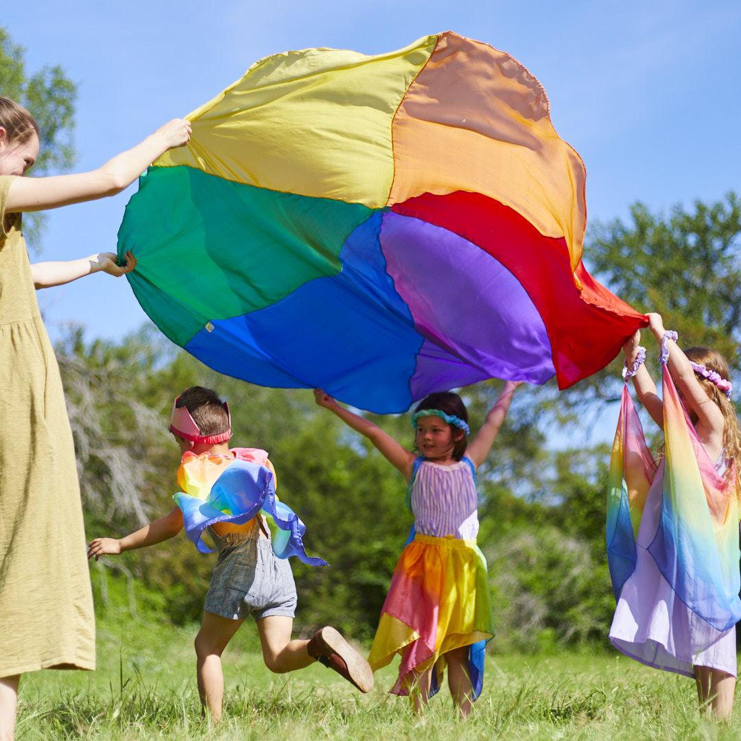 Children playing in a flower field